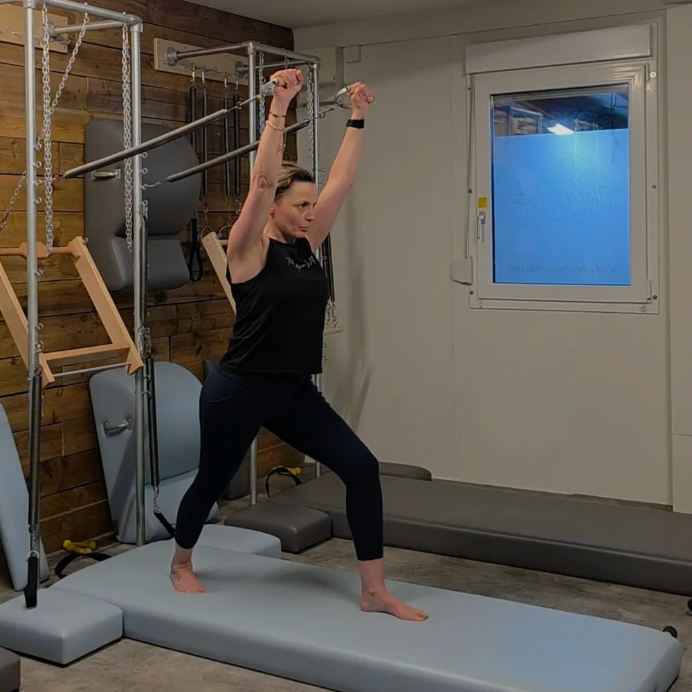 A client stretching on the Tower at Pilates From Within, Haslemere